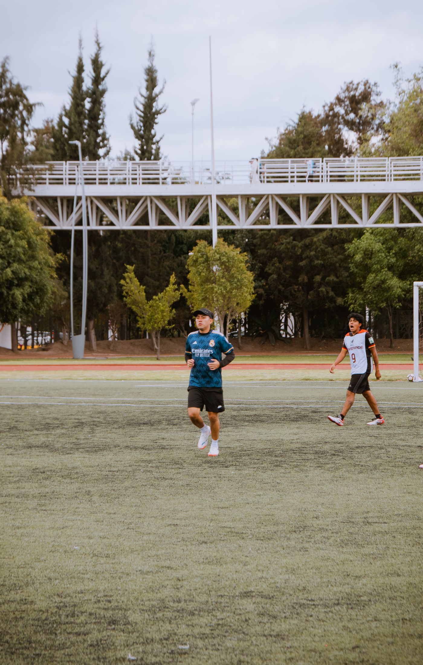 Soccer players training on an outdoor field in Puebla Mexico
