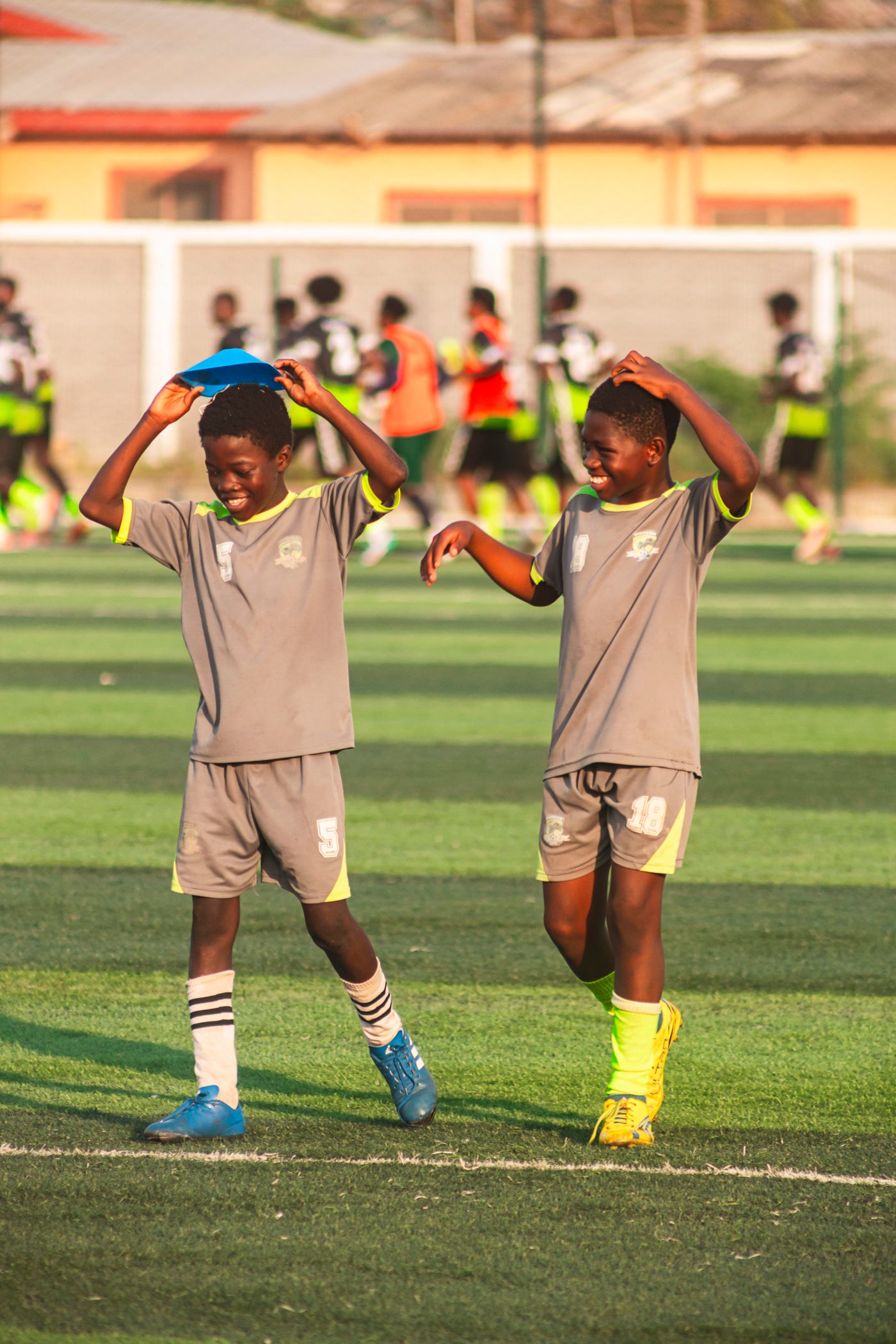Youth soccer players walking during training