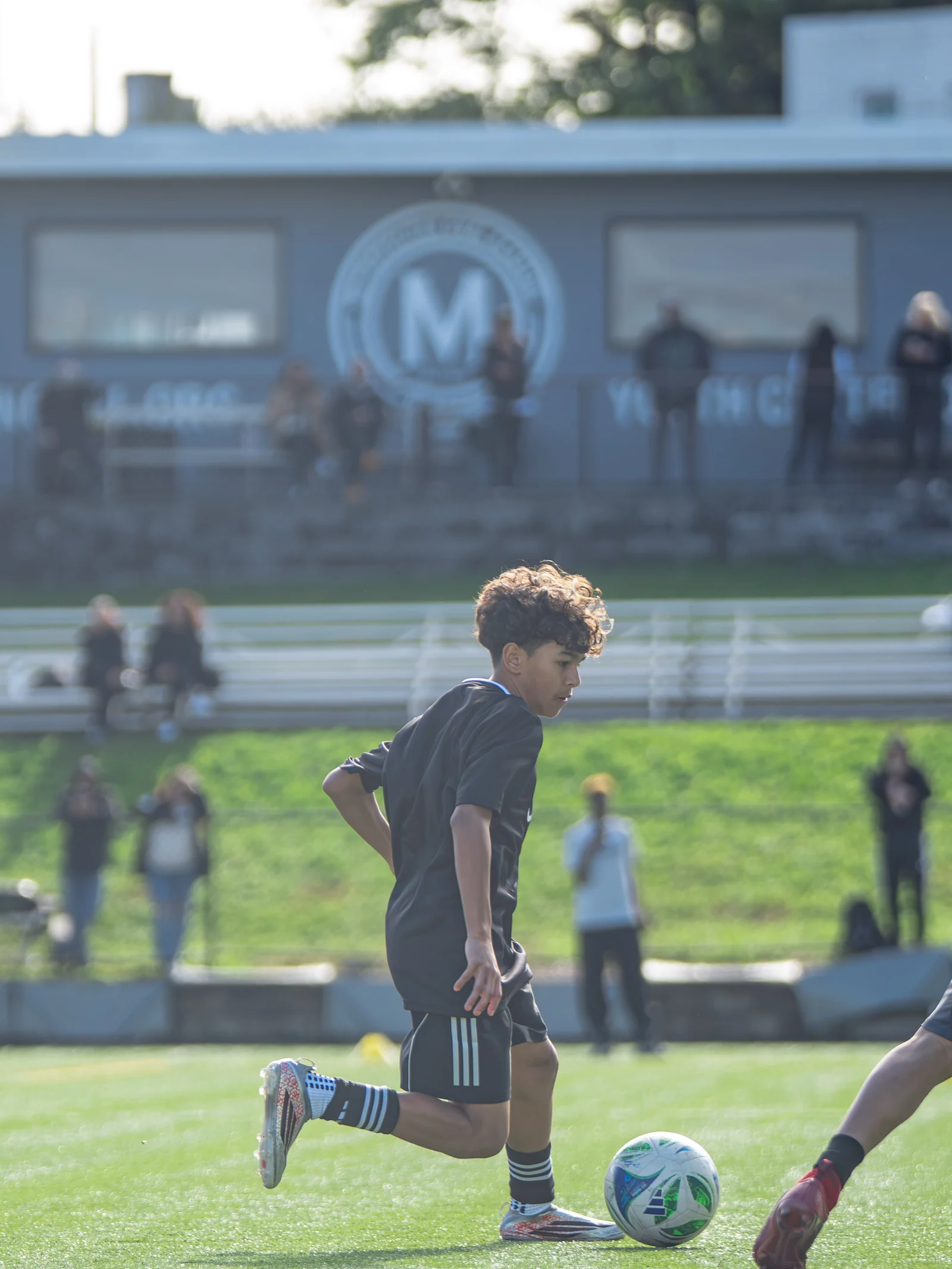 A player dribbles the ball during the October 12 Showcase at Met Oval